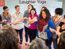 team building with laughter yoga in the Porto office